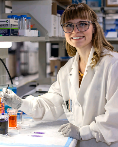 Reese Wilcox works in a lab setting.